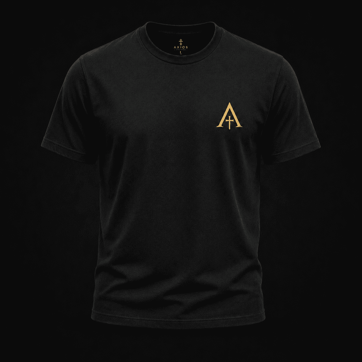 Black Heritage Tee front with a small Byzantine Gold Axios monogram on the left chest